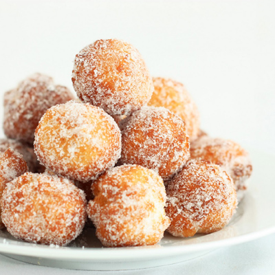 Donuts made from scratch in 15 minutes! So easy and delicious, this recipe is a definite keeper.