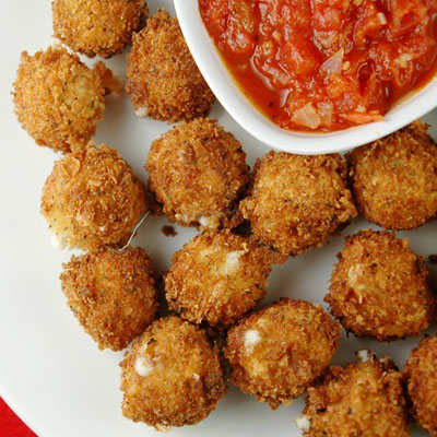 Fried Mozzarella Balls with Quick Tomato Sauce. Who doesn't love fried cheese?