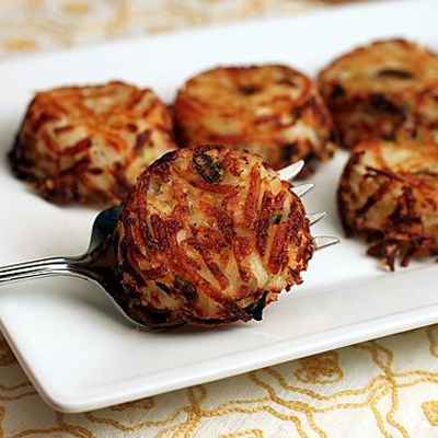 Individual Parmesan Hash Brown Cups - baked in muffin pans; they're crispy, delicious, and easy to make and serve.