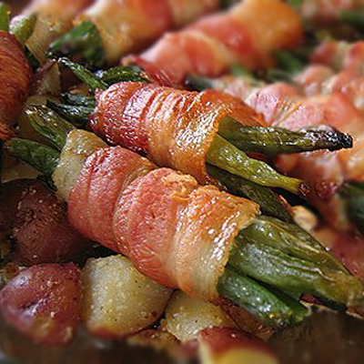 This is a hit in our house. Green beans wrapped in bacon-y goodness then oven-roasted.