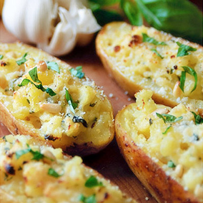 These Pesto Baked Potatoes are crazy good! Step by step photo directions.