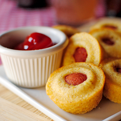 Mini Corn Dog Muffins. Sweet cornbread and salty hot dog combine in a fun, poppable snack, perfect for the Super Bowl.