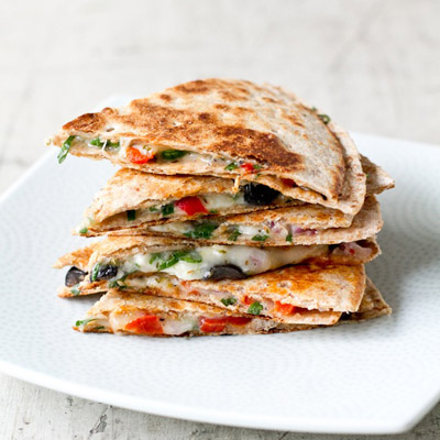Quick, healthy, and delicious. This Greek take on quesadillas is a perfect weeknight meal.