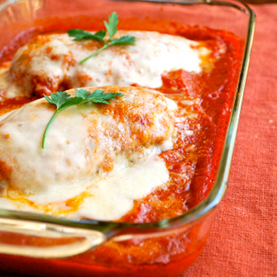 This Chicken Parmesan is deceptively healthy. It's lightly breaded, browned in a skillet for some color and then baked.