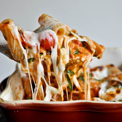 Creamy Caprese Pasta: fresh mozzarella, grape tomatoes and basil ribbons.