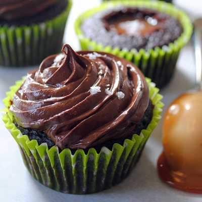 Classic chocolate cupcakes filled with salty, sticky caramel and topped with the rich fudge frosting and Maldon sea salt.
