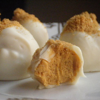 Pumpkin Cream Cheese Truffles. Perfect for any Halloween or Thanksgiving gathering.