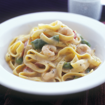 Tagliatelle with shrimps, asparagus and dill cream sauce.