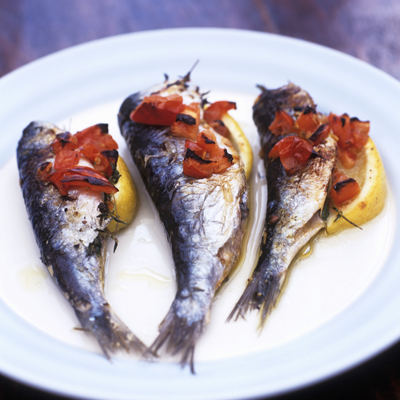 Time for some fish, try this recipe for grilled sardines with tomatoes.
