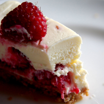 The only recipe you'll ever need again as long as you live (not very long, probably, if this is all you eat) - the most fantastic white chocolate and raspberry cheesecake.