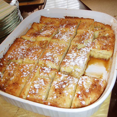 Yummy & easy french toast bake -- my brother made this for brunch -- it does not need anything else (ie. syrup). Great to serve upside down so the sugar & butter soaks in. Very easy to pull together.
