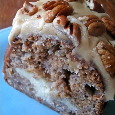 Apple and Cream Cheese Bundt Cake with Caramel Pecan Frosting