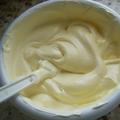 All you do is mix one vanilla pudding packet with half of the milk called for on the package. Whisk until it begins to thicken. Then fold in one container of Cool Whip. A great frosting spread on cakes and piped onto cupcakes, a tasty filling in crepes or on waffles along with some fruit.