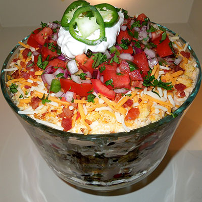 Layered Southwestern Cornbread Salad... this is awesome!
