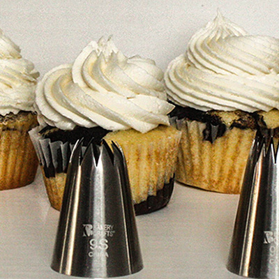 Cupcake Piping 101 - Learn to pipe beautiful swirls of frosting on your cupcake in 7 different ways!