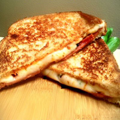 Grilled Cheese Pizza Tastes like a pizza and a grilled cheese sandwich! This sounds really good.