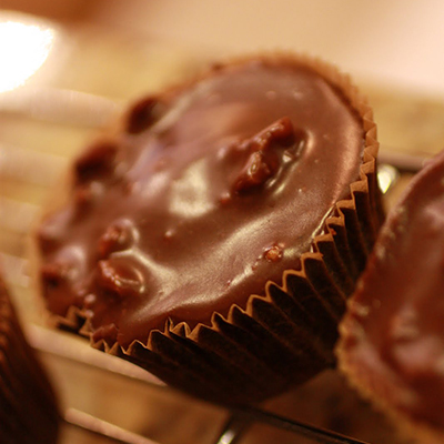 Texas Sheet Cake Cupcakes. "I actually prefer the recipe prepared this way (so easy to serve). We call them Texas Poppers! I also make these in mini bundt pans and the way the icing fills that little hole... oh my! Delicious!