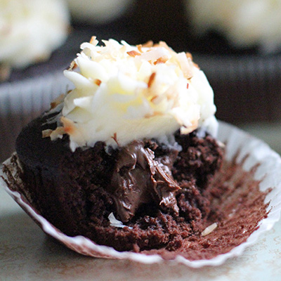 Nutella-Filled Chocolate Cupcakes with Coconut Cream Cheese Frosting (Gotta try these - YUM!)