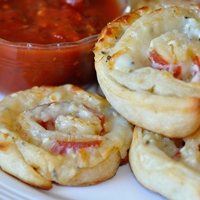 Pizza Rolls - A quick and fun way to enjoy pizza. Perfect for the kids for dinner or even an appetizer for a party.