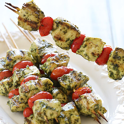 Skinny Grilled Pesto Chicken and Tomato Kebabs ~ These chicken kebobs just SCREAM summer, made with skinny basil pesto and grape tomatoes, flo fat, calories and salt.
