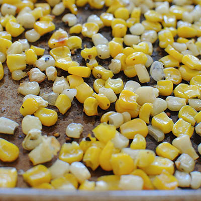 Take frozen corn, place on a baking sheet with oil, salt and pepper, place under the broiler. Five minutes later you’ll have perfectly roasted corn.