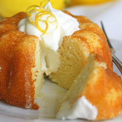 Lemon Yogurt Bundt Cake with Limoncello Glaze - Ultra moist and very tender, this cake falls on the texture spectrum somewhere between a butter cake and a soft pound cake. You can make these as 12 mini-bundts, or as one large full-size bundt if you're in big cake mood.