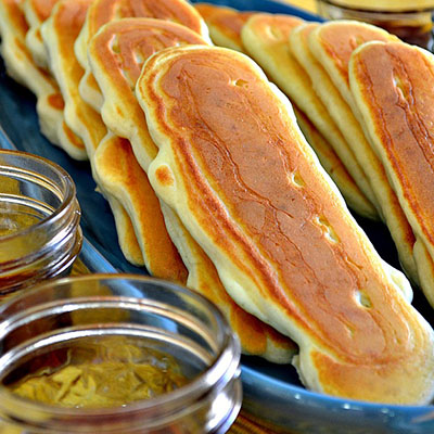 Pancake dippers. Bacon in the middle!