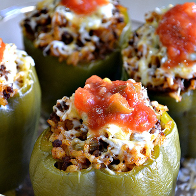 You can make this Mexican Style Stuffed Peppers dish spicy or mild depending on the level of heat that’s in your salsa. Make these peppers ahead of time for an easy weeknight dinner.