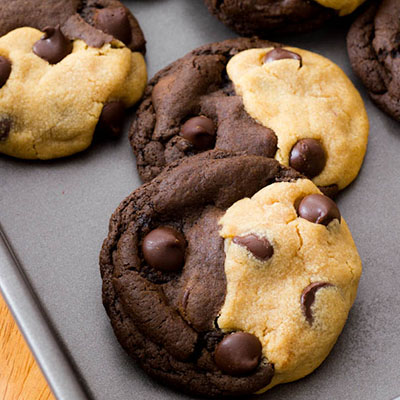 "Biting into one is like reaching chocolate & peanut butter bliss. The intense chocolate fudge cookie with dark chocolate chips mixed with a soft peanut-butter-overloaded cookie and MORE dark chocolate chips… could you really ask for anything more?"