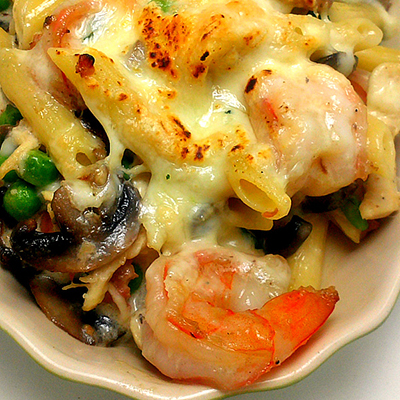 Bacon, Butter, Cheese & Garlic: Ziti al Forno... a decadent creamy pasta with chicken shrimp prosciutto and mushrooms.