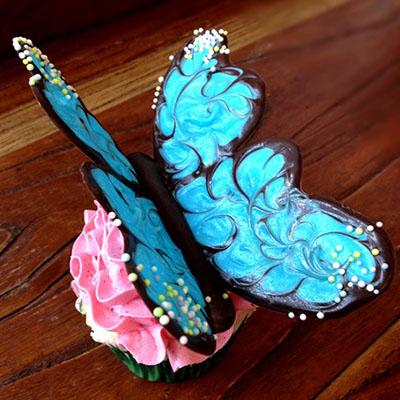 Butterfly Cupcakes with Raspberry Swiss Meringue Icing