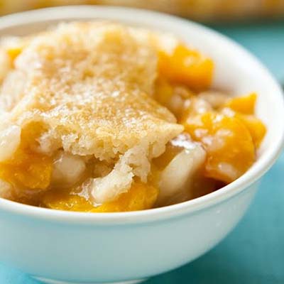 Crockpot Cobbler - Mix 4 c fresh or frozen peaches with 1/4 c sugar. Put in crock pot. Mix 1 c Bisquick, 1/2 c sugar, 1 c milk. Top peaches with dough mix. Low 3 hours or until set. Serve with vanilla ice cream, if desired.