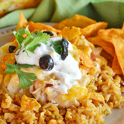 This cheesy chicken Doritos casserole comes together fast and easy, and will please even the pickiest of eaters!