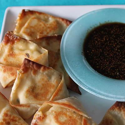 Baked Sriracha Cream Cheese Wontons with a Spicy Soy Sauce