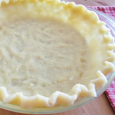Wham Bam Pie Crust - Super simple pie crust!!! No cutting in butter, super chilled water or rolling it out!! Just mix it up & press it into the pan!