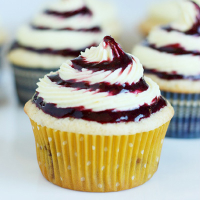 Blueberry Cupcakes with Lemon Buttercream Frosting and Blueberry Sauce