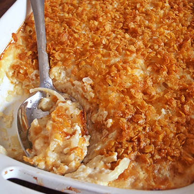 Cheesy Hashbrown Casserole with Corn Flake Topping... yum!