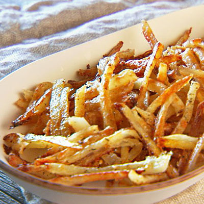 Italian Fries Recipe - oven-baked fries tossed in olive oil, grated cheese, and a medley of dried herbs.