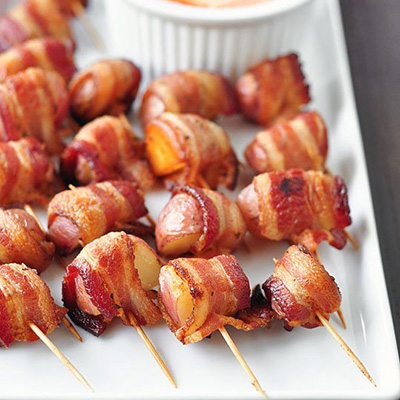 Bacon-Wrapped Potato Bites with Spicy Sour Cream Dipping Sauce - an easy hit at potlucks!