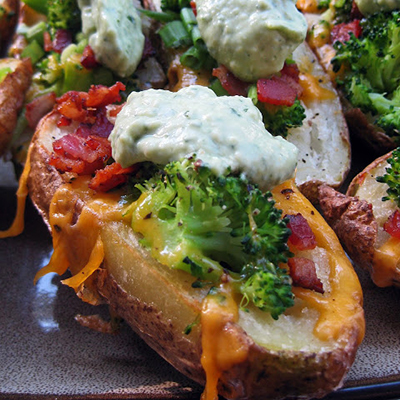 Cheddar Broccoli Loaded Baked Potato Skins with Avocado Creme