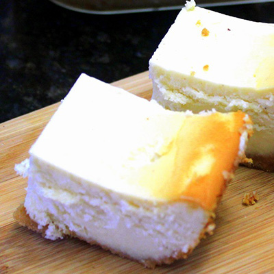 EggNog Cheesecake Bars - "OH BOY, a new favorite CheeseCake!!! Puffs up beautifully, Creamy Sweet with a smell and lingering taste of Christmas that you can have YEAR ROUND!"