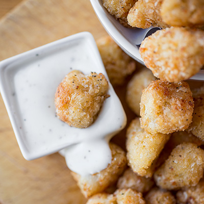 Crispy Parmesan-Cauliflower Poppers with Creamy Buttermilk Ranch Dipping Sauce