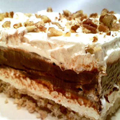 CHOCOLATE DELIGHT ~ easy to make layered desert with a pecan shortbread crust with layers of rich chocolate pudding and creamy cheesecake-y goodness, topped with whipped cream and more pecans - YUM!!!