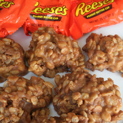 Reeses Krispies Melt 4 peanut butter cups and 2 tablespoons of peanut butter in a pan with 3 tablespoons of butter; Dump in 6 cups of Rice Krispies and stir again; Press into a greased pan, and let cool for two or three minutes; Flip the pan of treats out onto a cutting board; Cut out shapes with cookie cutters; Cool a little longer, then eat!