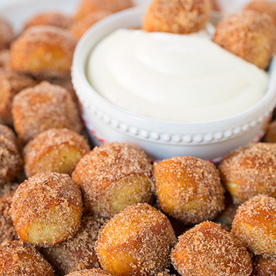 Copycat Auntie Anne's Cinnamon Sugar Pretzel Bites with Fluffy Cream Cheese Dipping Sauce