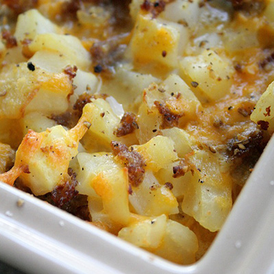 Cheesy Potato Breakfast Casserole... "This casserole is like the epitome of hashbrowns that are smothered and covered and everything in between. Cut up a few ripe tomatoes and toss them on top? Oh my heavens. You’ll never go back to Waffle House"