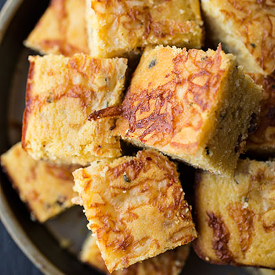 Cornbread with Crispy Bacon and Caramelized Onions. Serve with salted whipped butter and honey. Delicious.