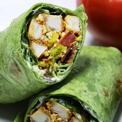 BLT Buffalo Chicken Wrap - make your brown bag lunch the envy of the office with these garden fresh wraps with the bold flavors of buffalo chicken. Also perfect for your picnics and tailgating parties. Step-by-step photos.