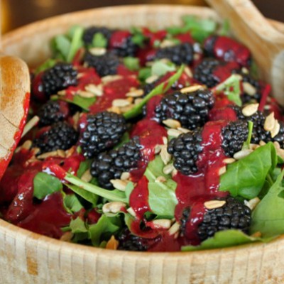 Baby Greens Salad With Blackberries and Sunflower Seeds. Very healthy and very appetizing. Blackberries, sunflower seeds, and more healthy ingredients.
