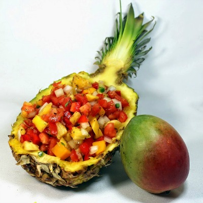 Mango Pineapple Pico de Gallo Salsa - All Fresh Ingredients! A wonderful little appetizer, a great snack, a BEAUTIFUL presentation, and even an AMAZING topping for a hamburger for your next BBQ! Serve with a bag of Fritos. Tropical fresh Mangos, Sweet Pineapple, and Savory Tomatoes combine for one of my most beloved dishes. The presentation is fabulous, and the taste is equal!